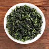 Tè Oolong biologico cinese Fujian an Xi Tieguanyin Oolong Green Tea Health Care Nuova fabbrica di alimenti per alimenti verdi primaverili Vendite dirette alla rinfusa