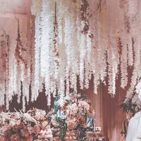 パーティーの結婚式の天井の装飾のための100センチの人工桜の黄色い花桜の花輪のアーチアイビーDIYパーティーDecof