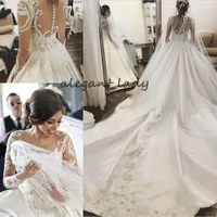 Cuello redondo Mangas largas Vestidos de novia de tren de la capilla 2019 Apliques de encaje de lujo Oriente Medio Árabe Princesa Iglesia Vestido de boda real Velo