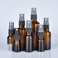 Gratis verzending 10 stks 10 ml / 15 ml / 30 ml / 50ml Amber glazen spuitflessen met zwarte fijne mistspuitmachines voor essentiële oliën, parfums