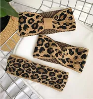 2019 invierno más cálido de las vendas de la nueva manera de punto para mujeres leopardo del Bowknot turbante ganchillo labra el cabello accesorios para niñas abrigo de la cabeza Hairband