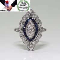 Omhxzj en gros de Solitaire européen anneaux de mode femme homme fête mariage cadeau de luxe bleu topaze zircon 18kt anneau or blanc rr660