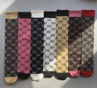 10 kleuren moda para volwassenen calcetines media seda las mujeres de los hombres amantes calcetines deportines