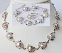 Las mujeres encantadoras de la joyería de la boda venden al por mayor el pendiente pendiente plateado plata de la perla del shell blanco de 12m m.