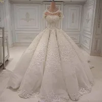 Projektant Suknie Ślubne Eleganckie Długie Gorgeous Dubai Arabia Suknia Balowa Koronki Aplikacje Kryształowe Koraliki Krótkie Rękawy Suknie Ślubna Suknia Ślubna