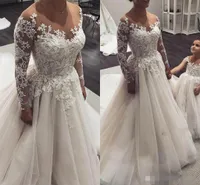 2020 Długie rękawy Suknie ślubne Linia Klejnot Sheer Neck Lace Aplikacja Sweep Pociąg Zroszony Wedding Bridal Suknia Vestido de Novia
