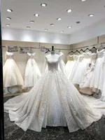 Robe de mariée de la robe de bal de Dubaï Abito da Sposa Joyau Sheer Col Robe de mariée à manches longues avec appliques robe de mariée tulle en dentelle