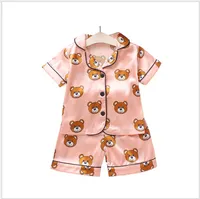 Diseñador verano infantil pijamas conjuntos niños diseñador ropa chicas niños bebé dibujos animados oso hogar ropa de dos piezas juego de manga corta niño