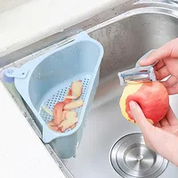 Kitchen Sink triangular del tamiz de drenaje de verduras Frutas Escurridor cesta ventosa esponja estante de almacenamiento ToolSink Filtro Shelf