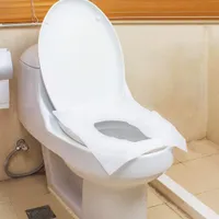 10pcs / set Toilet Seat Sedili Viaggi monouso toilette copertura stuoia della toletta Carta impermeabile Pad Covers biodegradabile monouso sanitaria