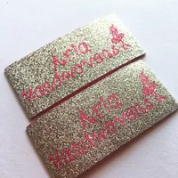 Etichetta tessuta personalizzata per panni all'ingrosso 1000pcs personalizzato marchio marchio logo personalizzato metallo argento tessuto tessuto etichette