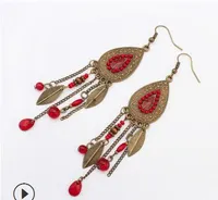 Retro ethnic style jewelry fashion oval leaf earrings exaggerated Indian rice beads long fringe earrings WY487