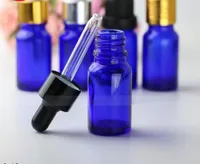 Envío gratuito azul vacíos botellas de vidrio esenciales de aromaterapia botellas de aceite de 10ml botellas rellenables gotero con tapas de plata Negro Oro