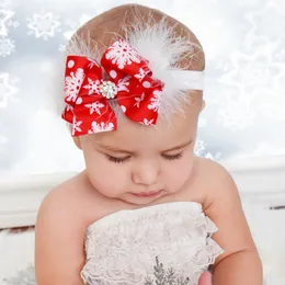 新しいファッションベビークリスマスのヘアバンド子供の弓結び目と羽毛のヘッドバンドの子供かわいいスノーフレーク赤い帽子