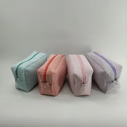 Kvinnor randiga seersucker rektanglar flap dragkedja kosmetiska påsar 4Colors gåva för resor