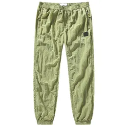 Odzież męska Spodnie marki Spring and Autumn New Style Metal Nylon Męskie Spodnie Spodnie Legginsy Moda