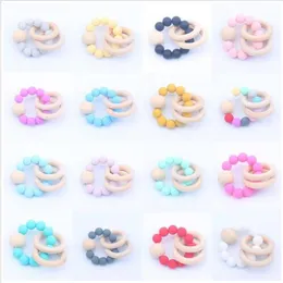 Baby Teether Ringar Mat Grade Beech Wood Teething Ring Soothers Tugg leksaker Dusch Spel Chew Round Wood Bead Nyfödd Silicone Teether LT1019