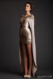 2019 NYA SAUDI ARABIEN STYLE SÄRSKILD DESIGNER EVENTKLED Guld Appliqued Kort framsida Långt Back Dubai Arabisk Prom Dress Vestidos 104