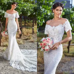 2020 Kwiatowy Mermaid Wedding Dresse Illusion Jewel Appliqued Lace Court Train Suknia Bridal Backless Custom Made Tulle Suknia Ślubna