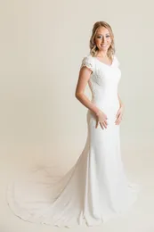 Sträck Crepe Mermaid Bröllopsklänningar Modest Cap Sleeves V Nacke Täckta Knappar Eleganta LDS Modest Bridal Gowns Ärmade Skräddarsydda