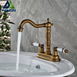 Luxury Dual Hole Brass Badrummet Basin Sink Faucet Deck Mount Två keramiska handtag mixer kranar Antik stil