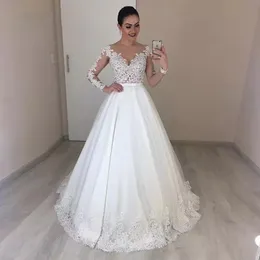 2020 New African Ball Gown Wedding Dresses Jewel Neck Illusion Lace Appliques Beaded Long Sleeves Sweep Train Plus Size Formal Bridal Gowns