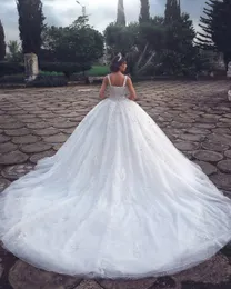 2022 Robes de mariée en cristal de luxe avec perles robe de bal pure illusion col spaghetti sans manches longues robes de mariée arabes BC27284D