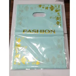50pcs 25 * 35cm Fiori d'oro Design Sacchetto regalo in plastica blu Abbigliamento Boutique Sacchetti per imballaggio Grandi sacchetti per la spesa in plastica con manici