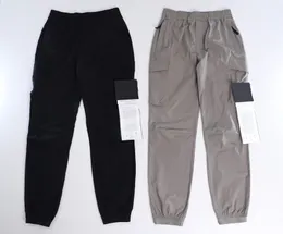 Calça masculina cor sólida konng gonng multi bolso macacão calça calças primavera e verão marca de moda retro jogging leggings menss para 2xl