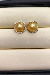 Encantador 9-10mm Mar del Sur plana redonda de oro pendiente de la perla 925 s