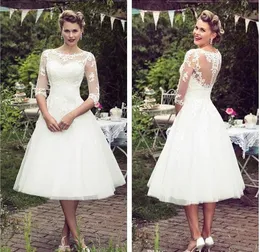 Abiti da sposa corti in pizzo stile vintage anni '50 mezze maniche in tulle con applicazioni di pizzo lunghezza tè abiti da sposa da sposa con bottoni matrimonio in campagna