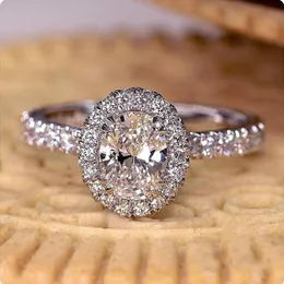 حجم 6-10 مذهلة مجوهرات فاخرة متألقة خاتم الماس الحقيقي 925 فضة البيضاوي قطع بيضاء توباز الأبدية النساء الزفاف خاتم الزفاف