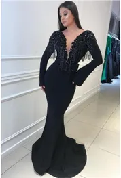 2020魅力的な黒の長袖人魚の深いVネックのビーズタッセルボディスウエディングガウンウエディングドレスセクシーな背中のエレガントなイブニングドレス