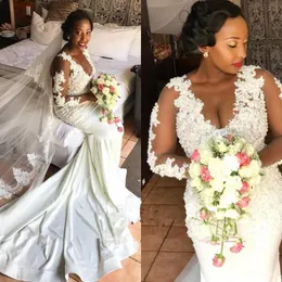 Afrikanska sjöjungfru bröllopsklänningar med illusion Långärmade plusstorlek Bröllopsklänningar Vestidos de Novia Designer Lace Appliques Bridal Dress