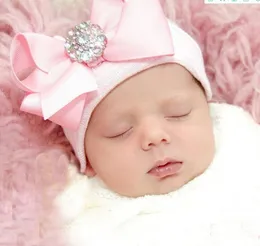 ヨーロッパとアメリカの生まれたばかりの赤ちゃんの帽子ベビー帽子大きな弓ニットプルオーバーキャップ春と秋のかわいい胎児の帽子Wy1435