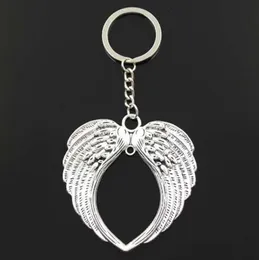 Fashion 20pcs / Lot Key Ring Keychain Smycken Silver Pläterad Hjärta Angel Wing Charms Pendant Key Tillbehör