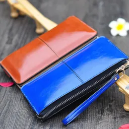 Hot Sale Women Wallets Candy Oil Läder Plånbok Lång Design Dag Koppling Casual Lady Cash Purse Kvinnor Handväska Carteira Lady Phone Bag