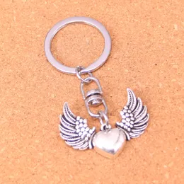 Mode nyckelring 36*27 mm flyghj￤rta h￤ngsmycken Diy smycken bilkedja ringh￥llare souvenir f￶r g￥va
