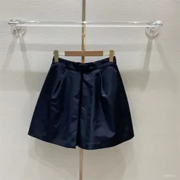 Wiosenne spódnice czarne z trójkątną modą wszechstronną krótką talię krótką, swobodną spódnicę A Sexy Mini Sukienka