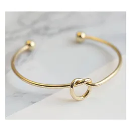 Европа и Соединенные Штаты Металлическое золото золото розовое золото украшают украшения простые ветровые браслеты персонализированные подарки узел браслет браслет 1 Shdn4