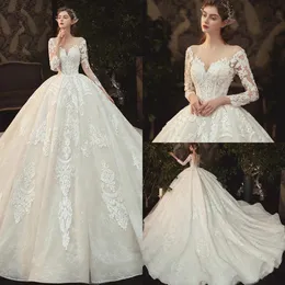 Amazing Beading Pearls Appliques Lace Illusion Princess Ball Gown Wedding Dress With Long Sleeves Sheer Neck Chapel Train Buttons Back Bride Vestido De Noiva AL9945