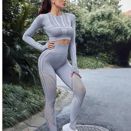 Yoga Outfit Seamless Hollow Suit Hip Raise Pants Sports High Waist Tight Fitness Long Sleeve Crop Top For Women Gym Set