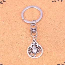 ファッションキーチェーン26*19mm Scorpion Scorpio Zodiac Pendants Diy Jewelry Car Key Chain Ring Holder Souvenir for Gift