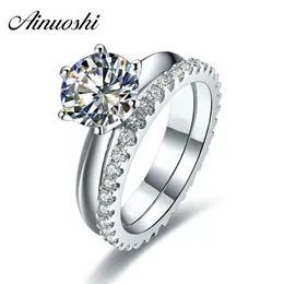 Ainuoshi Luxury 1/1,5/2 karat rund klippt vigselring set 925 sterling silver 2 st brud kvinnor förlovningsring full band y200107