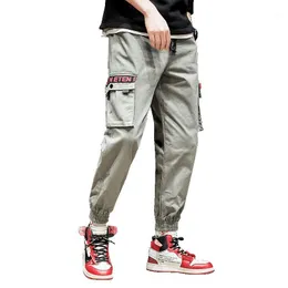 Pantaloni da uomo 2021 Primavera Autunno Pantaloni per il tempo libero per gli uomini Nero Grigio Colore Magic Bandage Piedi Cargo Skateboard Harem Kpop1