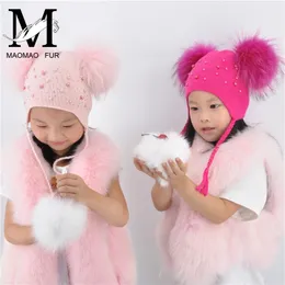 Kids Quente de inverno tampões duplos Pom Pom Pom Beanie lãs chapéu de malha para meninos meninos meninas reais guaxinim bolas de pele Beanie bonnet Y201024