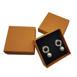 Orange Brand Presentförpackningskartong för halsband Örhängen Ring Papperskort Detaljhandelsförpackningslåda för modesmycken Tillbehör 9x9x3,5cm