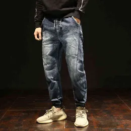 Moda Streetwear Mężczyźni Dżinsy Luźne Fit Splitty Designer Casual Denim Spodnie Cargo Winter Plus Velvet Hip Hop Ciepłe Spodnie Jogger G0104