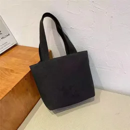 ファッションデザインの固体化粧品バッグキャンバスチェーントートショッピングハンドバッグカジュアルクラシックブラックレディースメイクアップバッグ