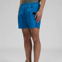Pantaloncini in nylon per sport casual all'aria aperta per giovani estivi Pantaloni larghi da spiaggia per uomo 5 punti